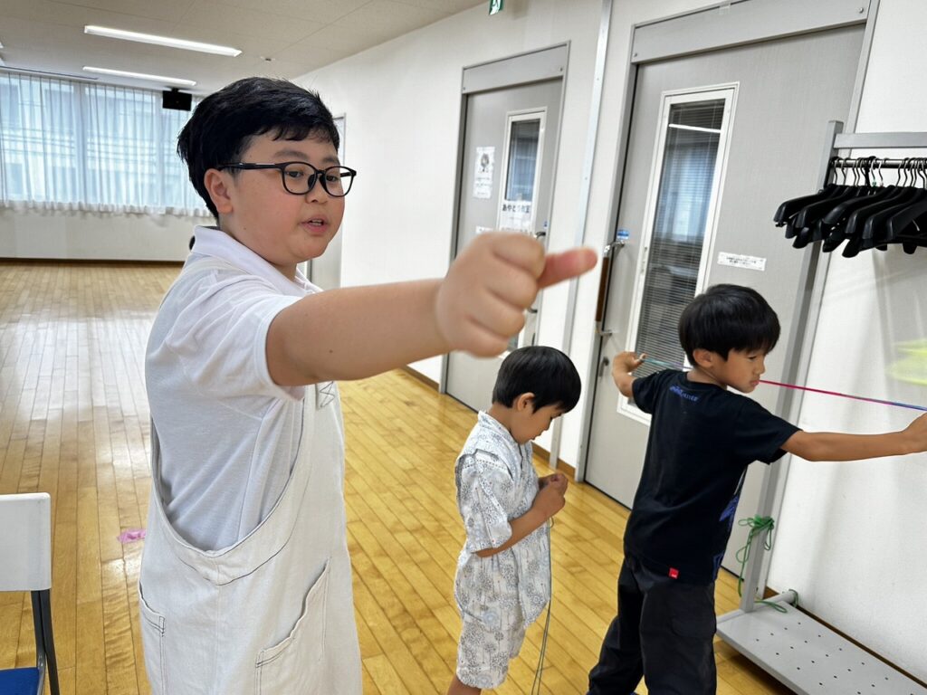 紐飛ばし